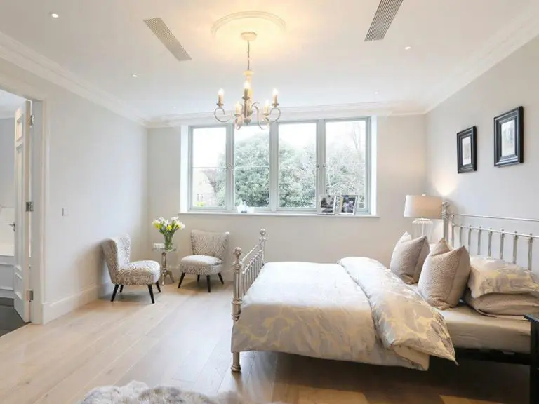 Slick bedroom with white windows