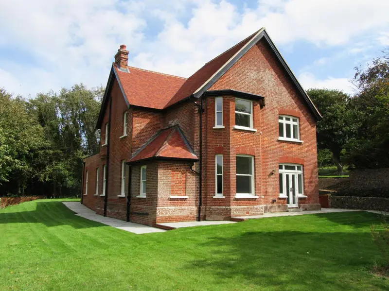 Large detached house with sash windows and french doors