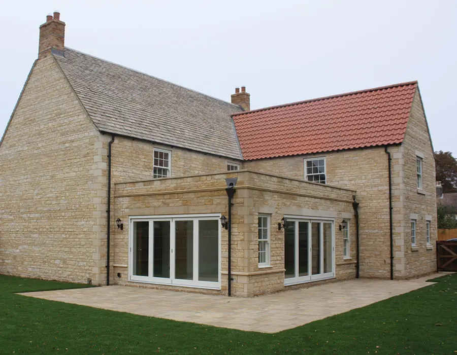 stone property with bi-fold doors