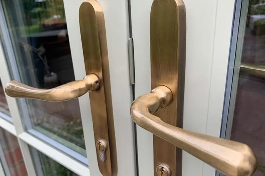 Close up of bronze door handles
