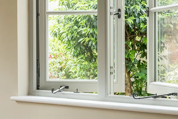 Open uPVC windows with monkey tail windows