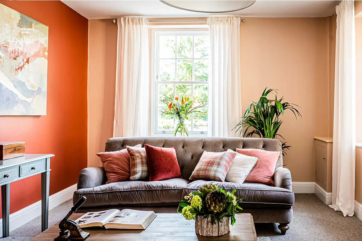 Living area with a white timber sliding sash window