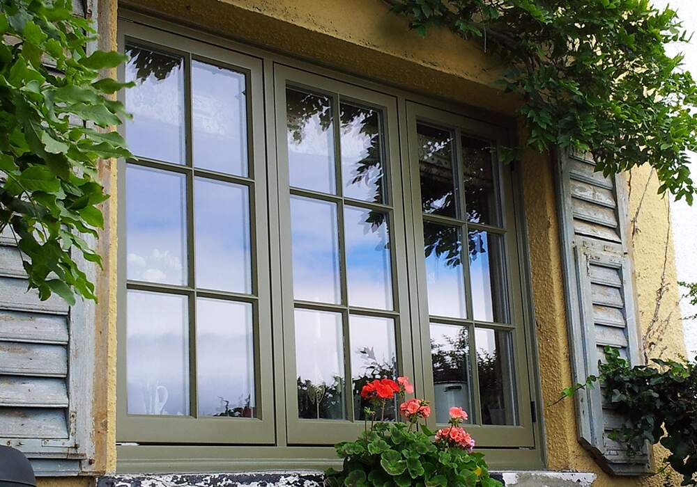 Green flush casement windows