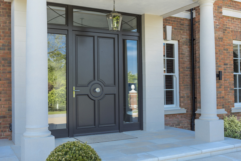 Entrance Door with Curved Bars and Sidelights