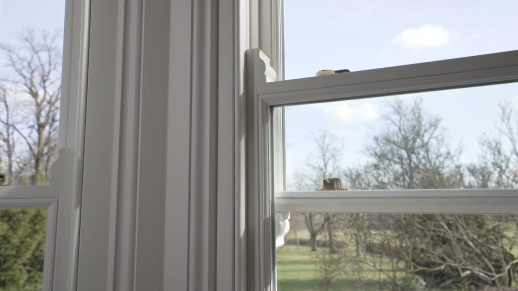 A white sliding sash window