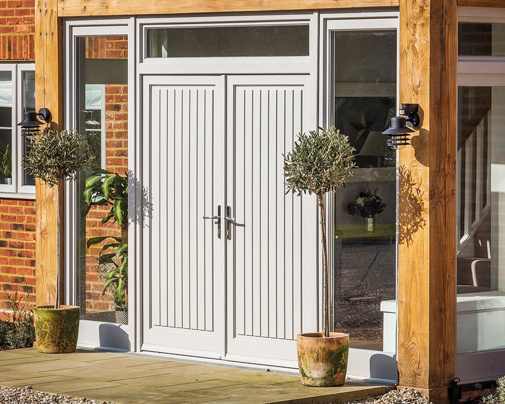 double set of solid doors with sidelights