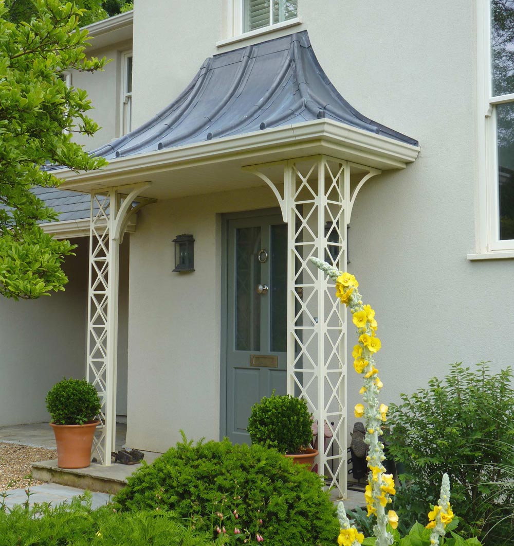 Exterior shot of a house with a grey timber door