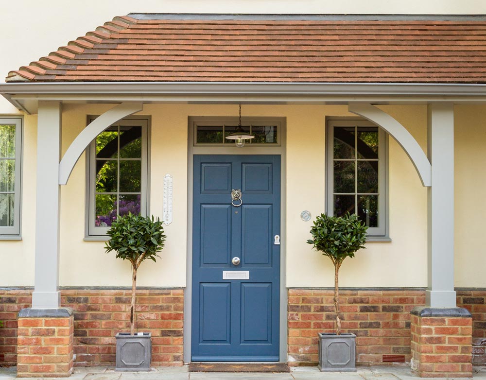 Blue front door with grey frame