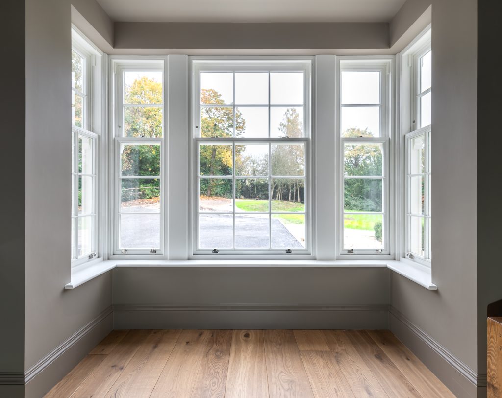 Interior view of sliding sash windows in bay configuration
