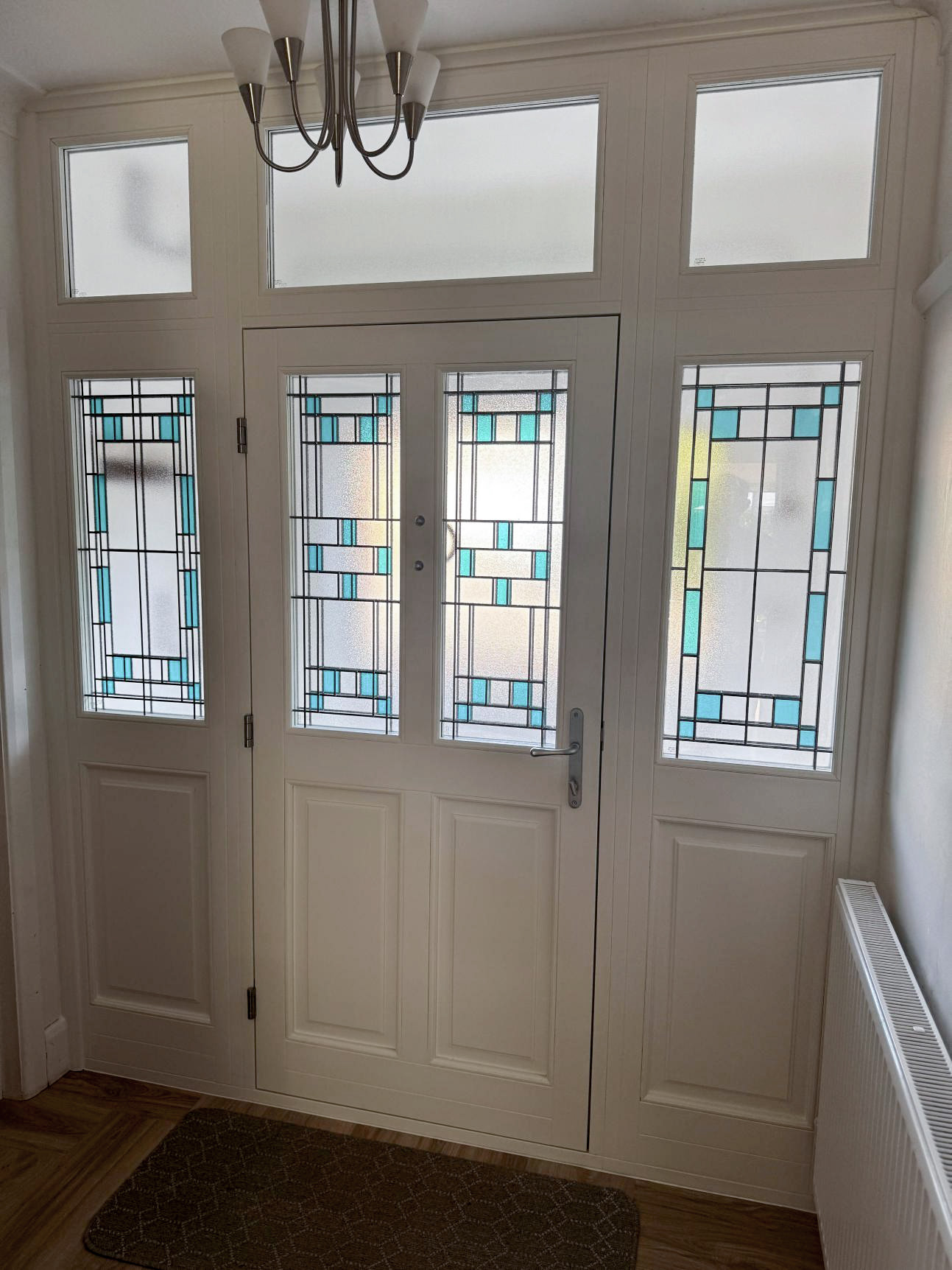 Shortlisted for Best Feature Door Installation: Bespoke Timber Entrance with Decorative Triple Glazing